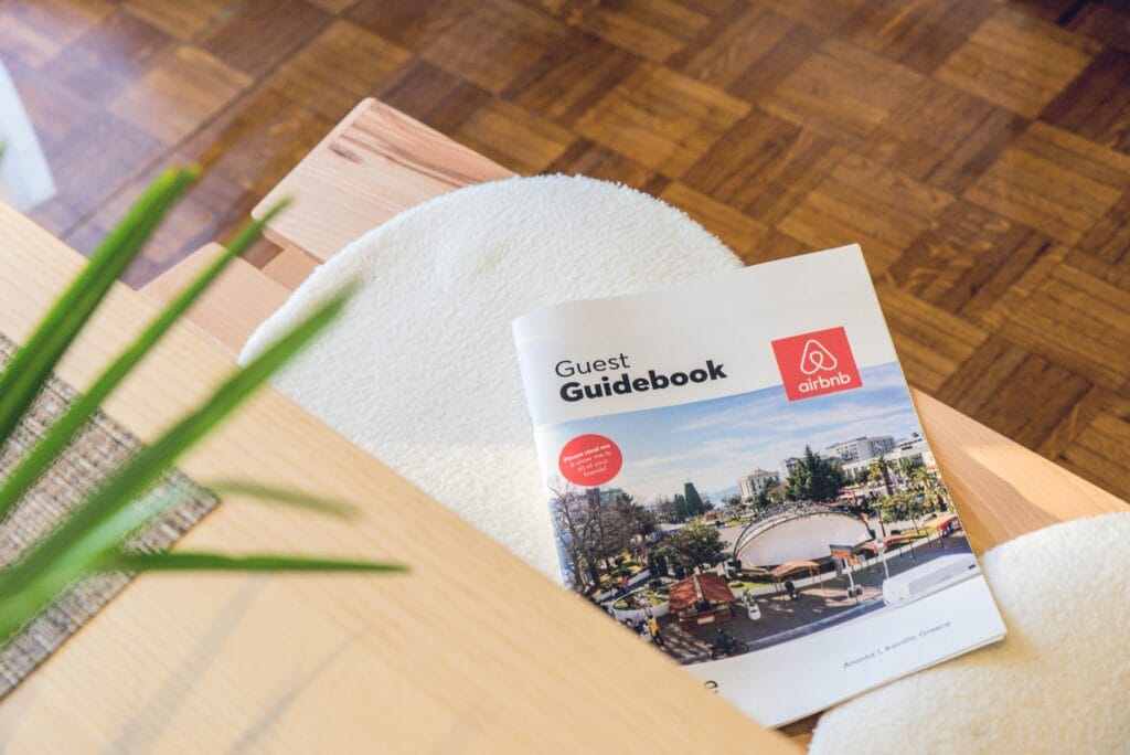 Airbnb Cleaning Guest Guidebook on a modern table in Kavala, Greece home.