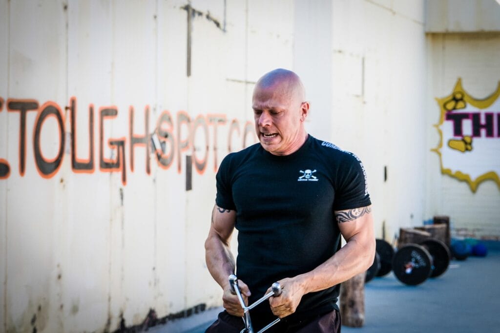 sled pull, pulling sled, pulling weight, crossfit, strongman, fitness, running backwards, gym, sled, pulling, sweating